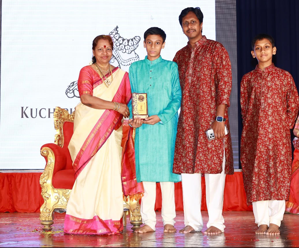 A student receiving an award on stage
